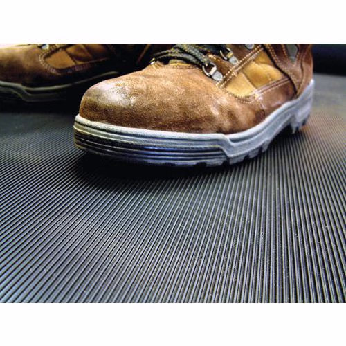 Tapis industriel à surface rainurée