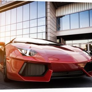 Feuille de mousse PVC – Voiture de sport rouge garée devant le bâtiment – 100×75 cm Photo sur feuille de mousse PVC Feuille de mousse PVC – Voiture de sport rouge garée devant le bâtiment – 100×75 cm Photo sur feuille de mousse PVC